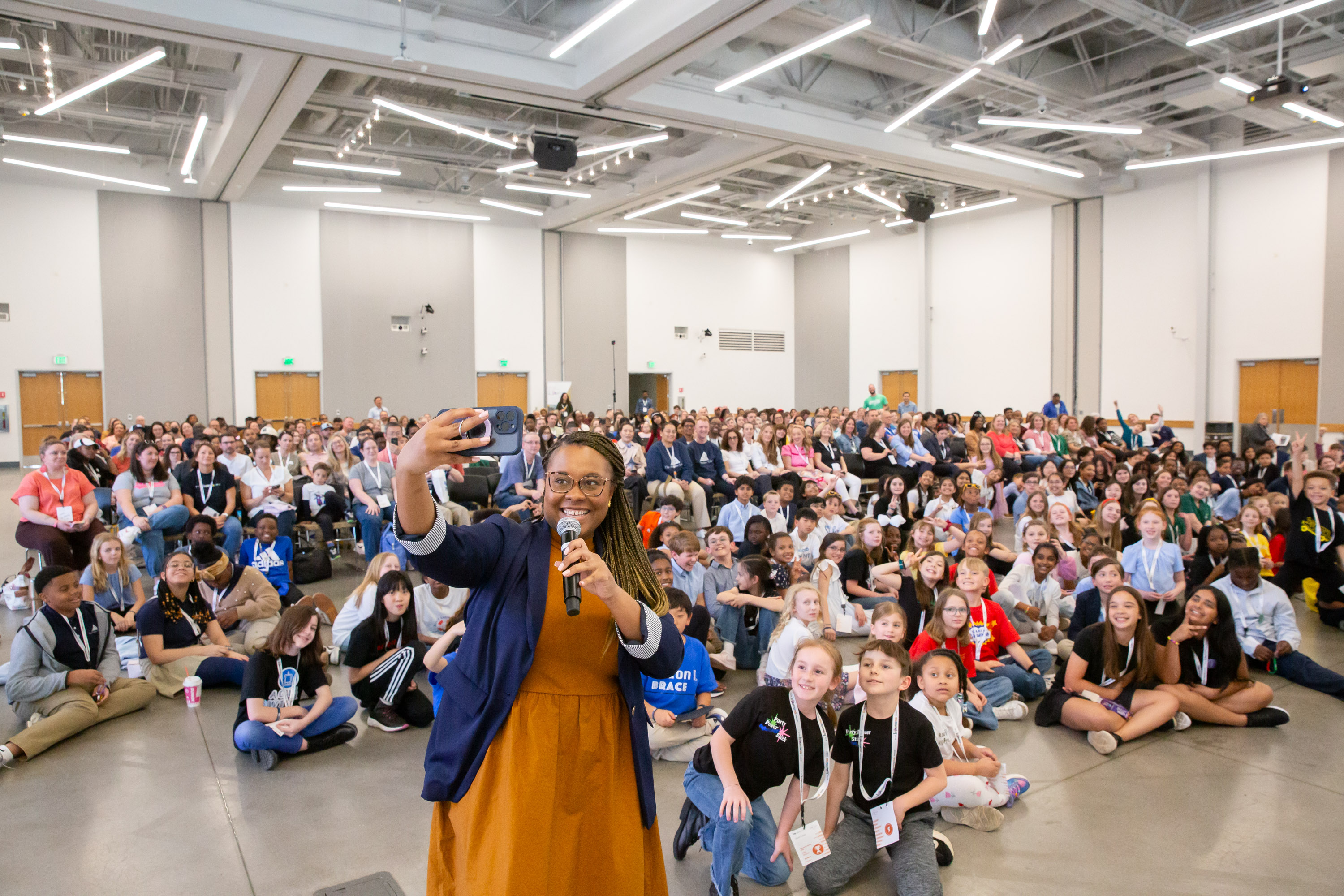K-12 InVenture Prize Director Danyelle Larkin took a selfie with student inventors.