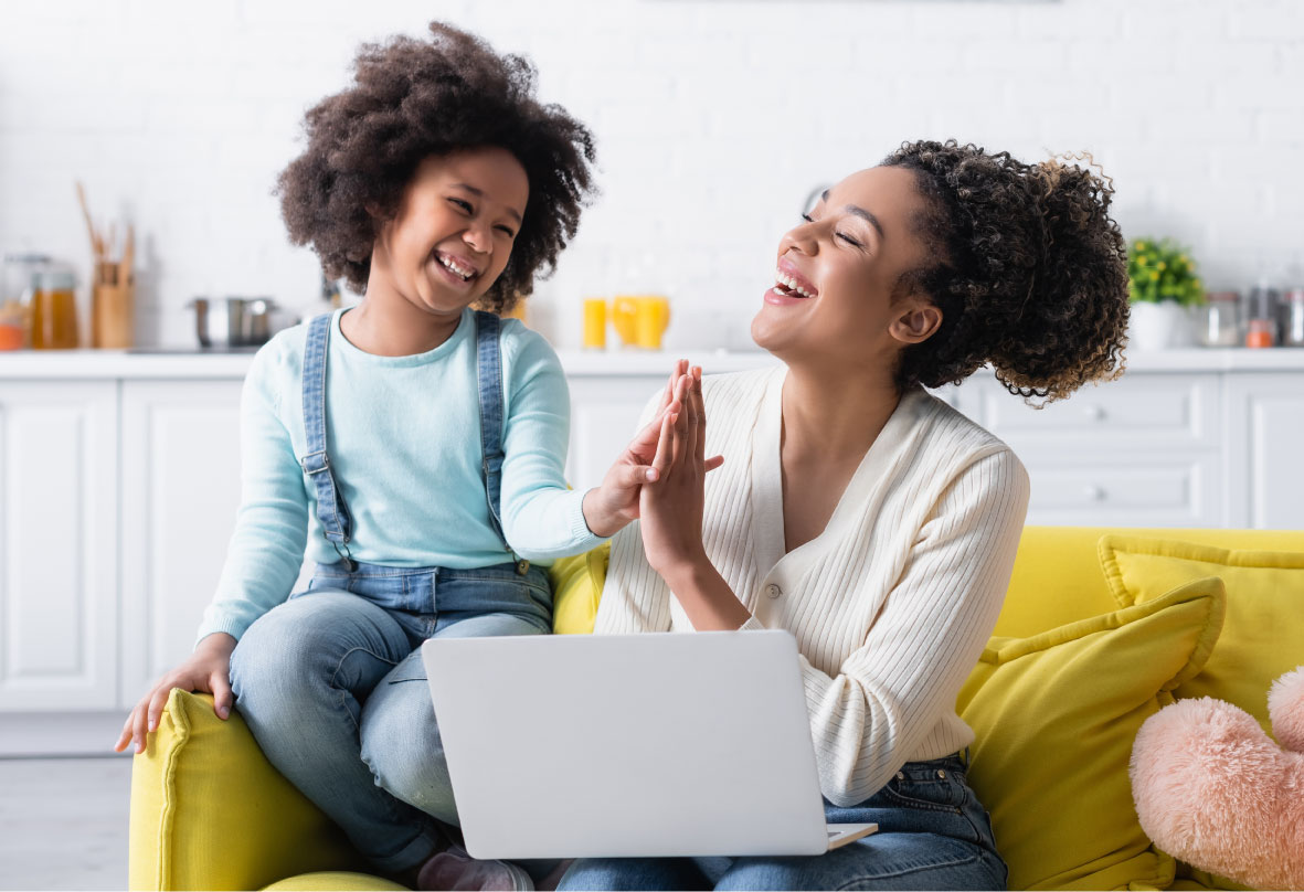 Child high fiving adult
